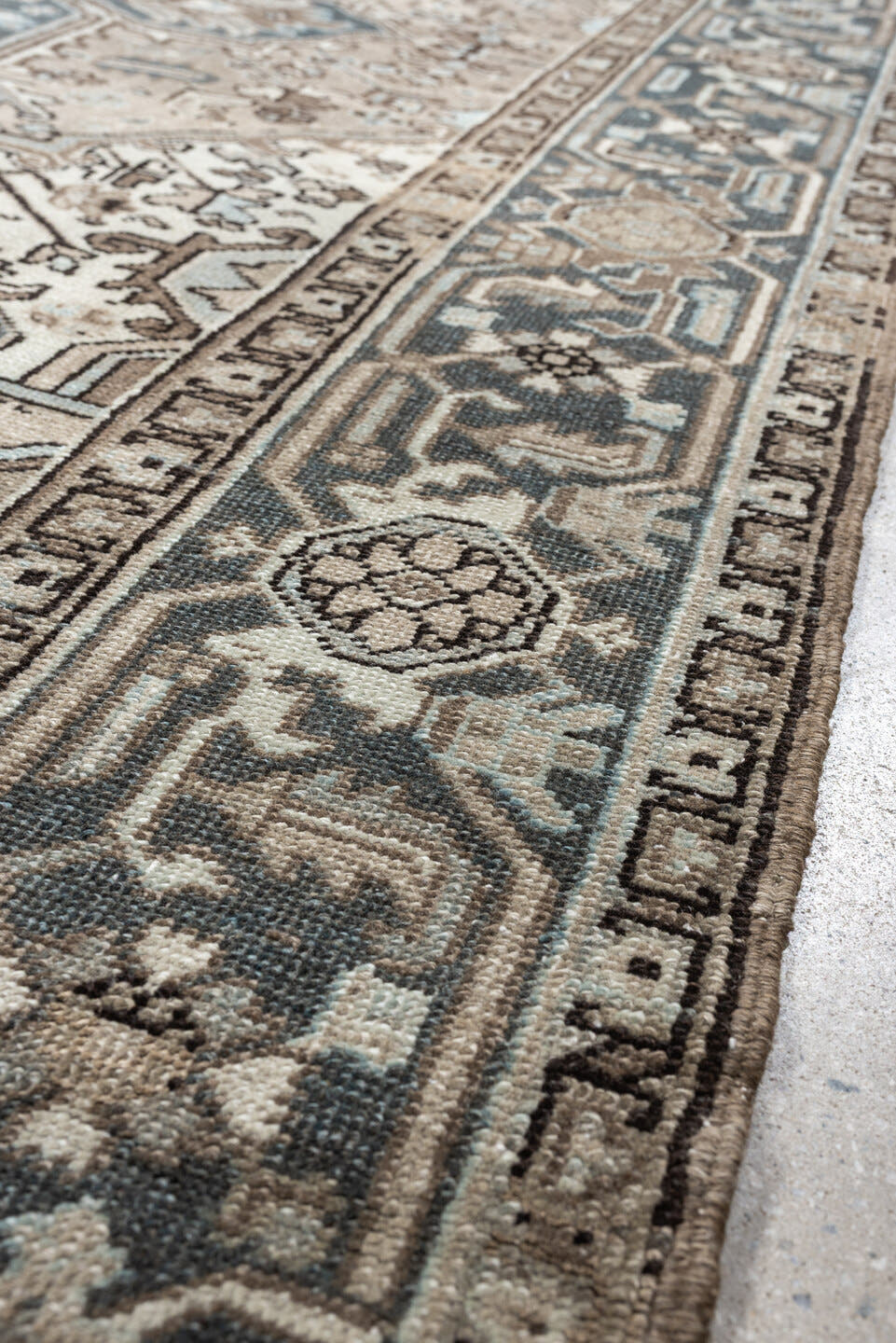 7' x 8' one-of-a-kind handmade antique Heriz rug. Color palette: ivory, blue gray, taupe, slate, brown, charcoal, sage