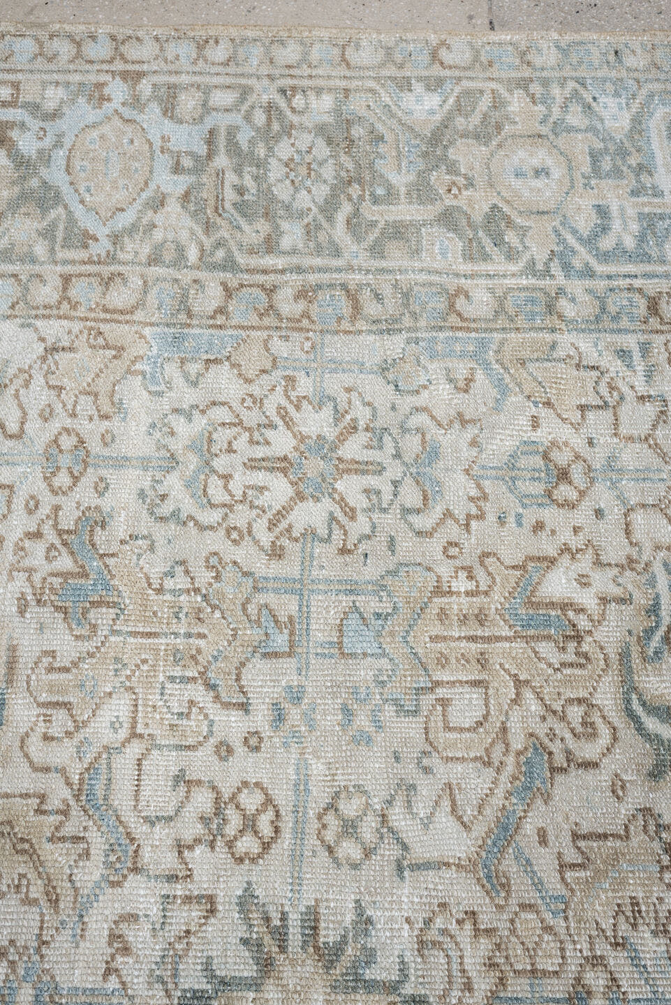 7' x 8' one-of-a-kind handmade antique Heriz rug. Color palette: ivory, pale blue, sage, taupe, blue gray, beige, charcoal