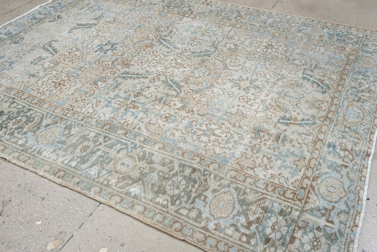 7' x 8' one-of-a-kind handmade antique Heriz rug. Color palette: ivory, pale blue, sage, taupe, blue gray, beige, charcoal