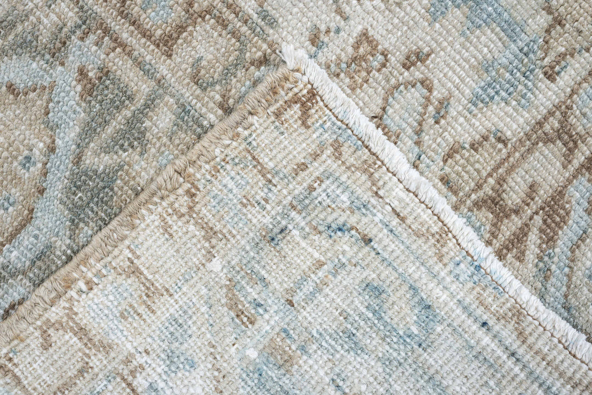 7' x 8' one-of-a-kind handmade antique Heriz rug. Color palette: ivory, pale blue, sage, taupe, blue gray, beige, charcoal