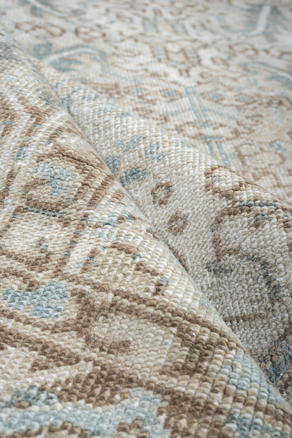 7' x 8' one-of-a-kind handmade antique Heriz rug. Color palette: ivory, pale blue, sage, taupe, blue gray, beige, charcoal