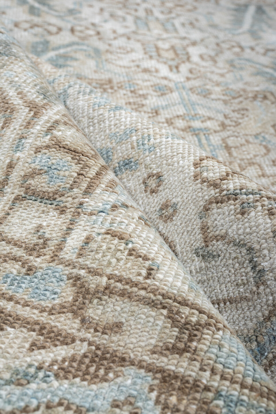 7' x 8' one-of-a-kind handmade antique Heriz rug. Color palette: ivory, pale blue, sage, taupe, blue gray, beige, charcoal