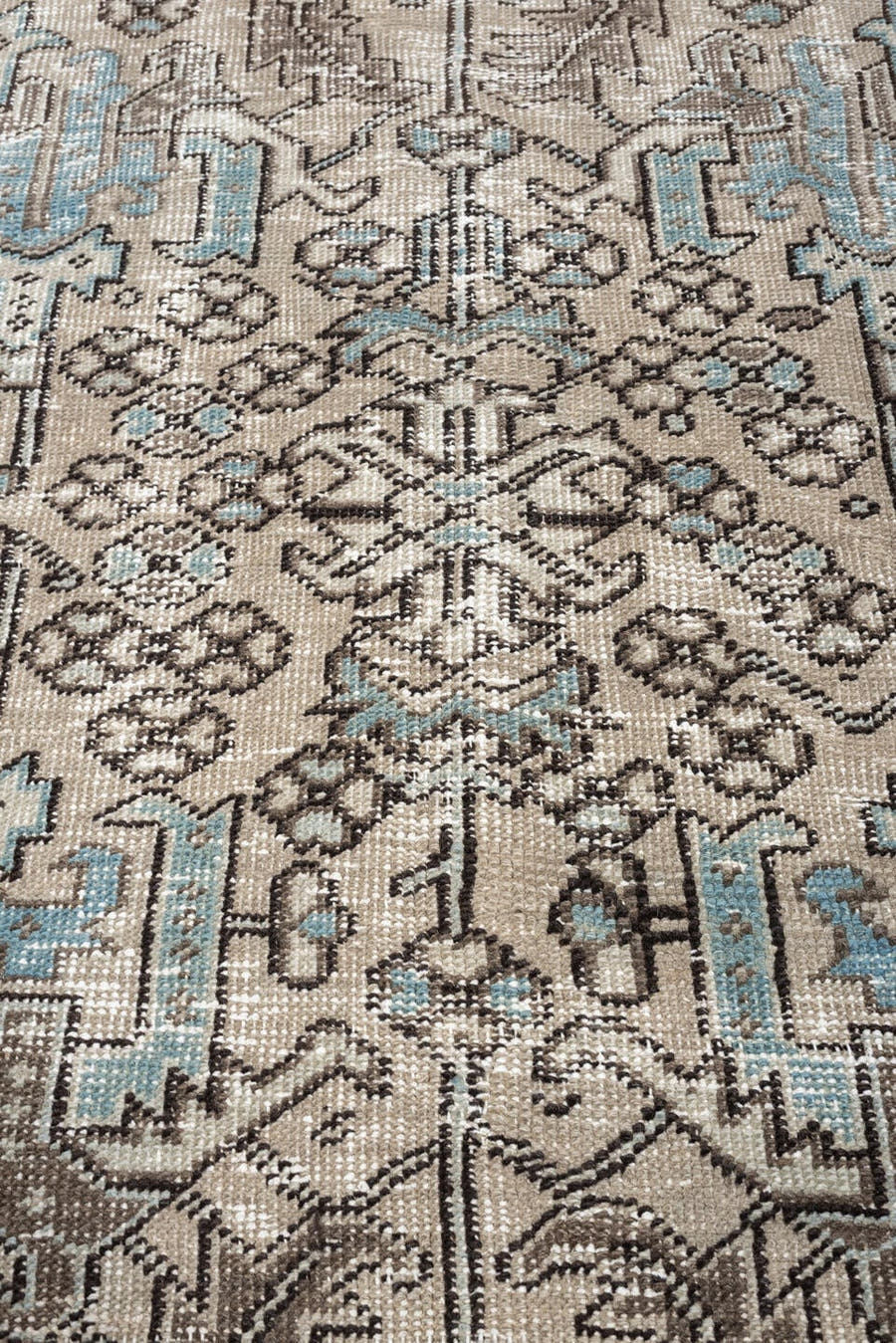 5' x 7' one-of-a-kind handmade antique Heriz medium size rug. Color palette: ivory, blue gray, aqua, charcoal, taupe, cream