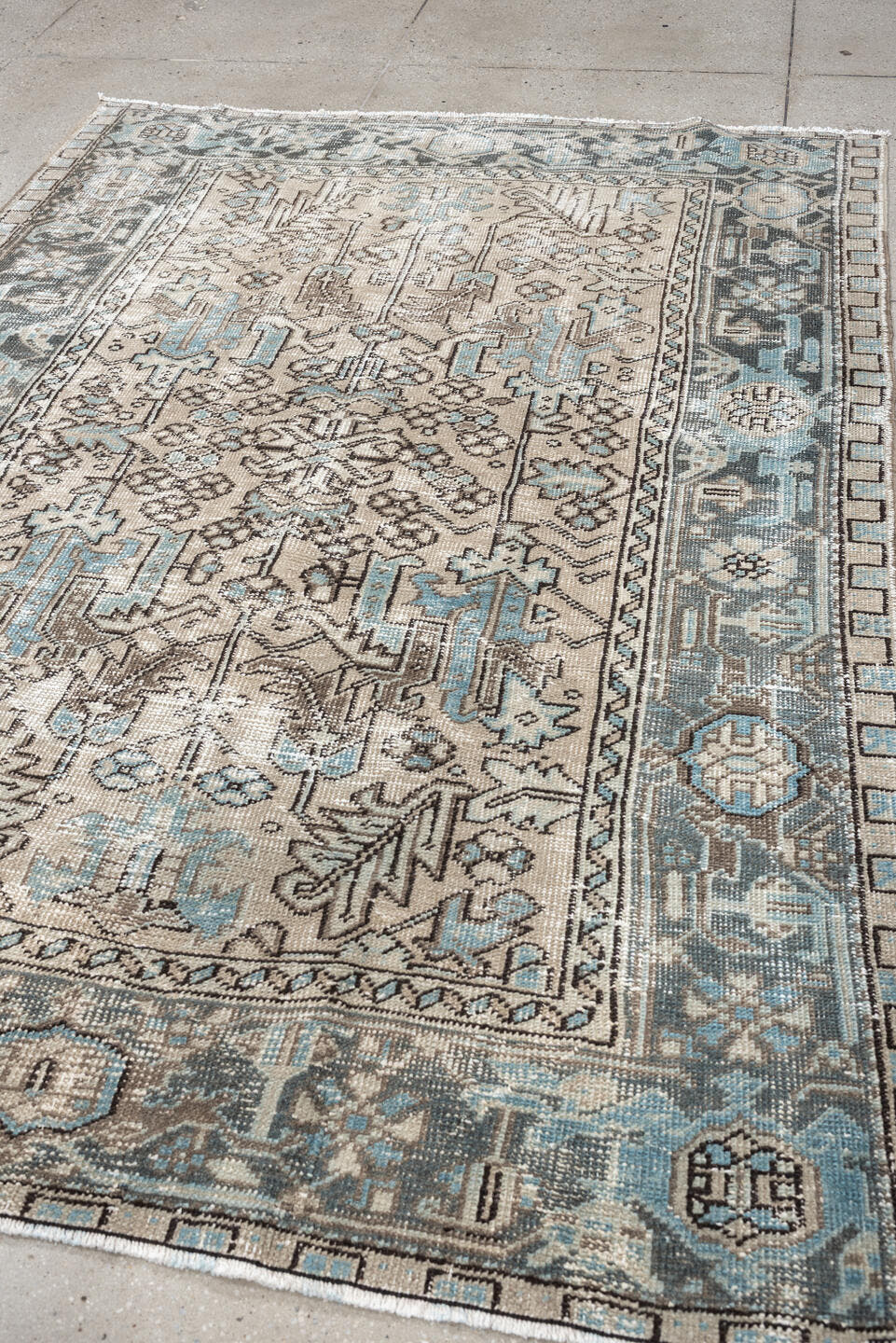 5' x 7' one-of-a-kind handmade antique Heriz medium size rug. Color palette: ivory, blue gray, aqua, charcoal, taupe, cream