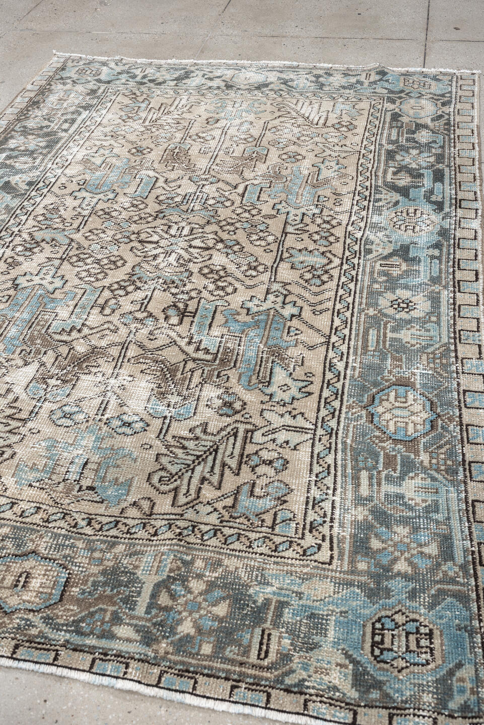 5' x 7' one-of-a-kind handmade antique Heriz medium size rug. Color palette: ivory, blue gray, aqua, charcoal, taupe, cream