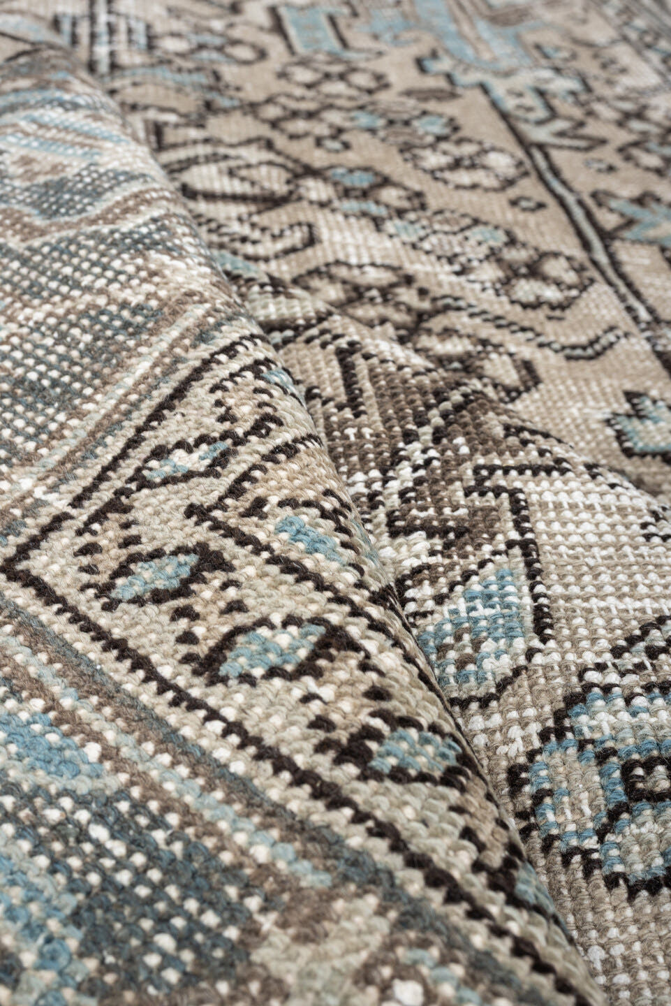 5' x 7' one-of-a-kind handmade antique Heriz medium size rug. Color palette: ivory, blue gray, aqua, charcoal, taupe, cream