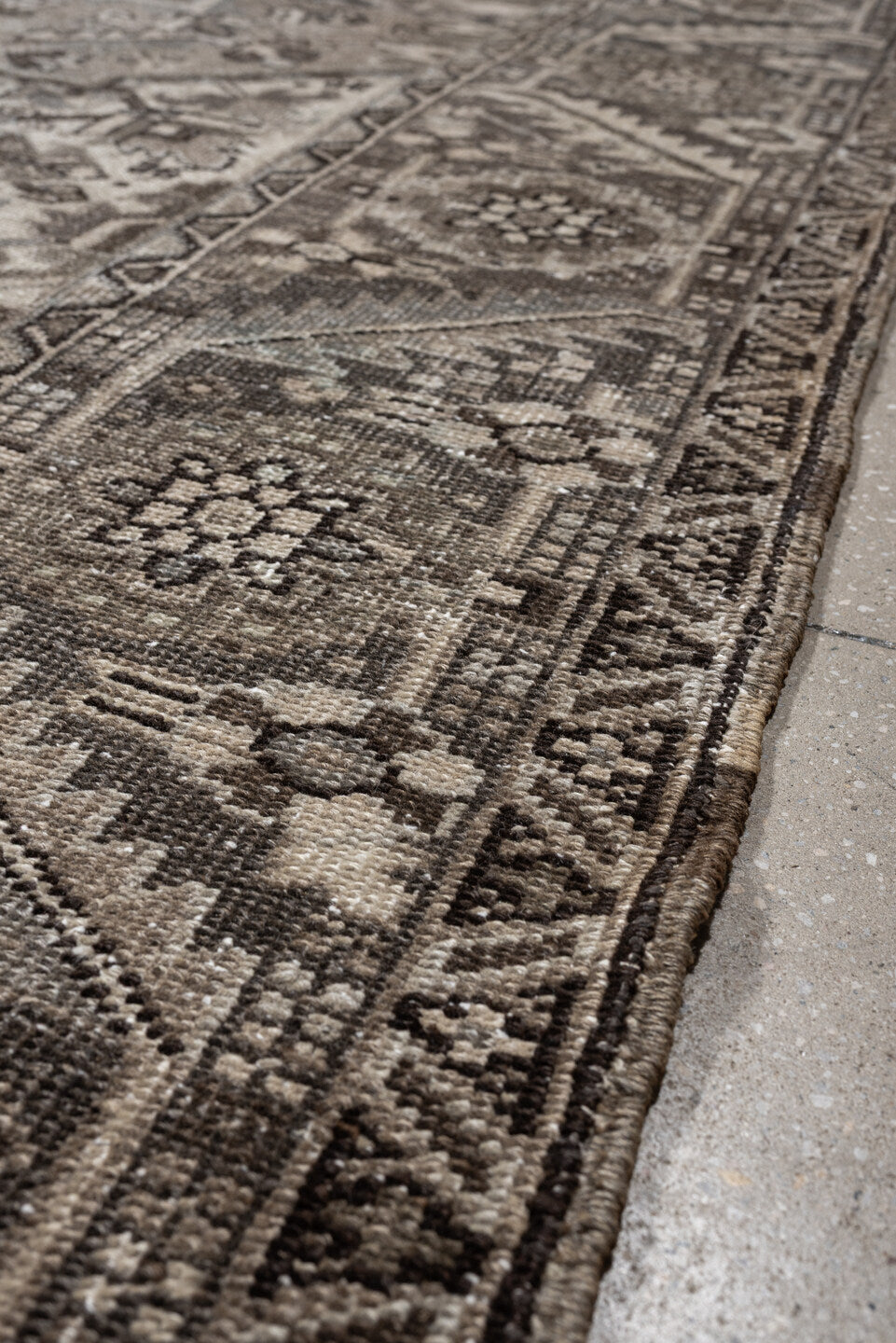 9' x 13' one-of-a-kind handmade antique Heriz large size rug. Color palette: taupe, ivory, charcoal, brown, slate, camel