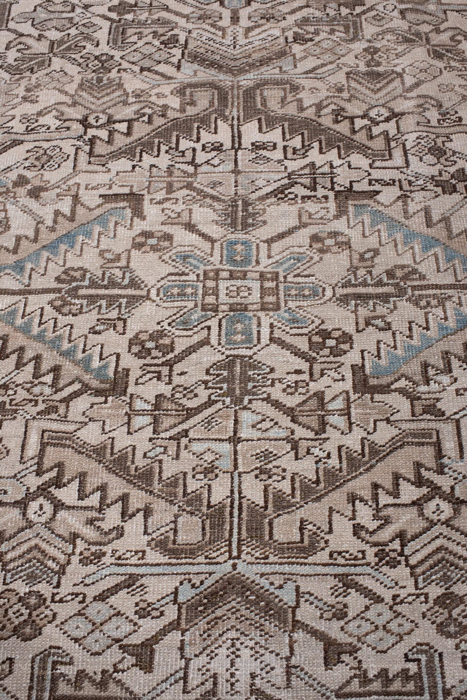 7' x 11' one-of-a-kind handmade antique Heriz large size rug. Color palette: ivory, blue gray, taupe, chocolate brown, slate