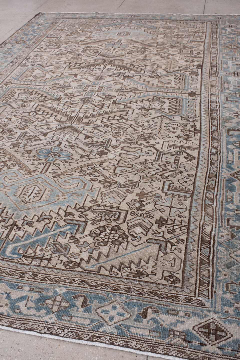 7' x 11' one-of-a-kind handmade antique Heriz large size rug. Color palette: ivory, blue gray, taupe, chocolate brown, slate