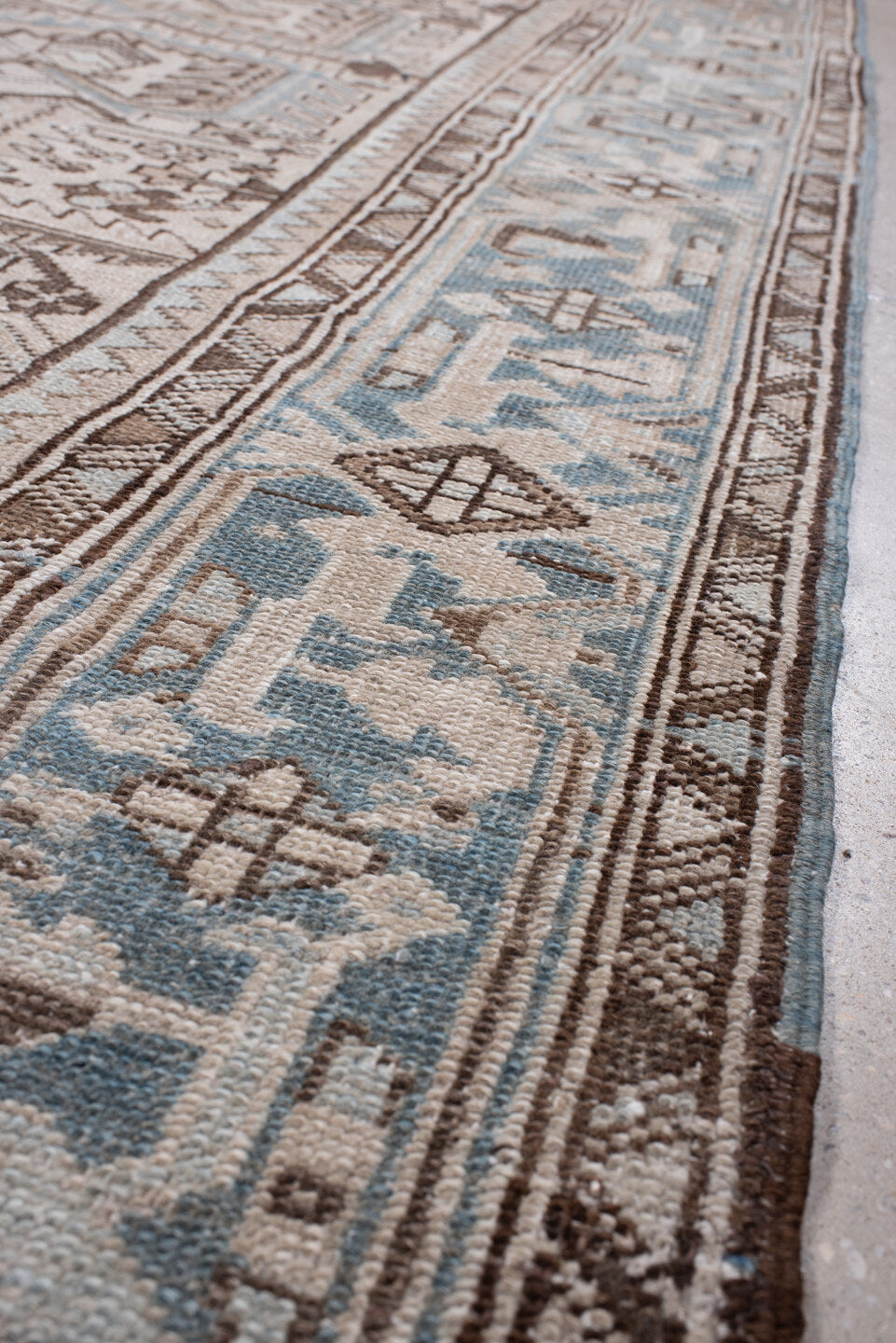 7' x 11' one-of-a-kind handmade antique Heriz large size rug. Color palette: ivory, blue gray, taupe, chocolate brown, slate