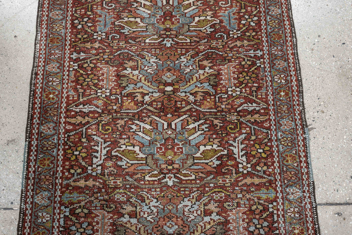 7' x 10' one-of-a-kind handmade antique Heriz large size rug. Color palette: rust, powder blue, ivory, olive, rose, charcoal