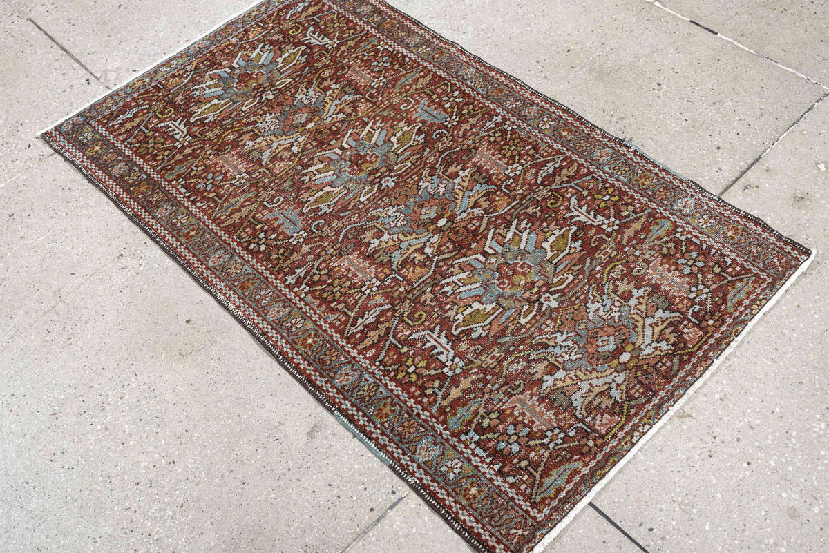 7' x 10' one-of-a-kind handmade antique Heriz large size rug. Color palette: rust, powder blue, ivory, olive, rose, charcoal