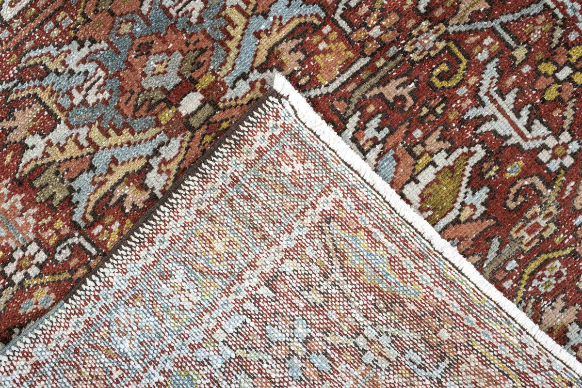 7' x 10' one-of-a-kind handmade antique Heriz large size rug. Color palette: rust, powder blue, ivory, olive, rose, charcoal