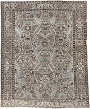 7' x 9' one-of-a-kind handmade antique Heriz large size rug. Color palette: ivory, taupe, charcoal, pale blue, gray, brown