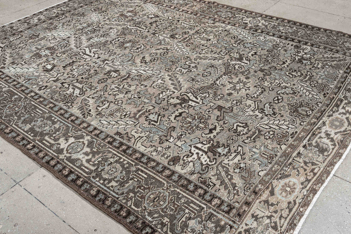 7' x 9' one-of-a-kind handmade antique Heriz large size rug. Color palette: ivory, taupe, charcoal, pale blue, gray, brown