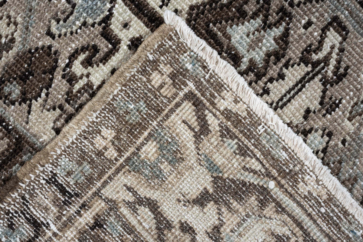 7' x 9' one-of-a-kind handmade antique Heriz large size rug. Color palette: ivory, taupe, charcoal, pale blue, gray, brown