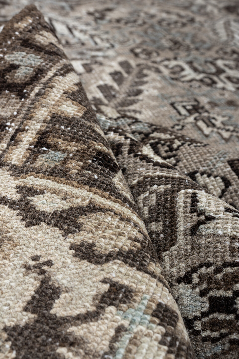 7' x 9' one-of-a-kind handmade antique Heriz large size rug. Color palette: ivory, taupe, charcoal, pale blue, gray, brown