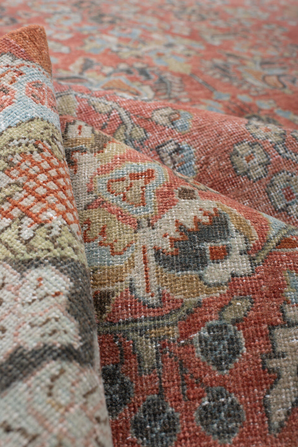 8' x 11' one-of-a-kind handmade antique Sarouk large size rug. Color palette: terracotta, powder blue, ivory, rust, charcoal