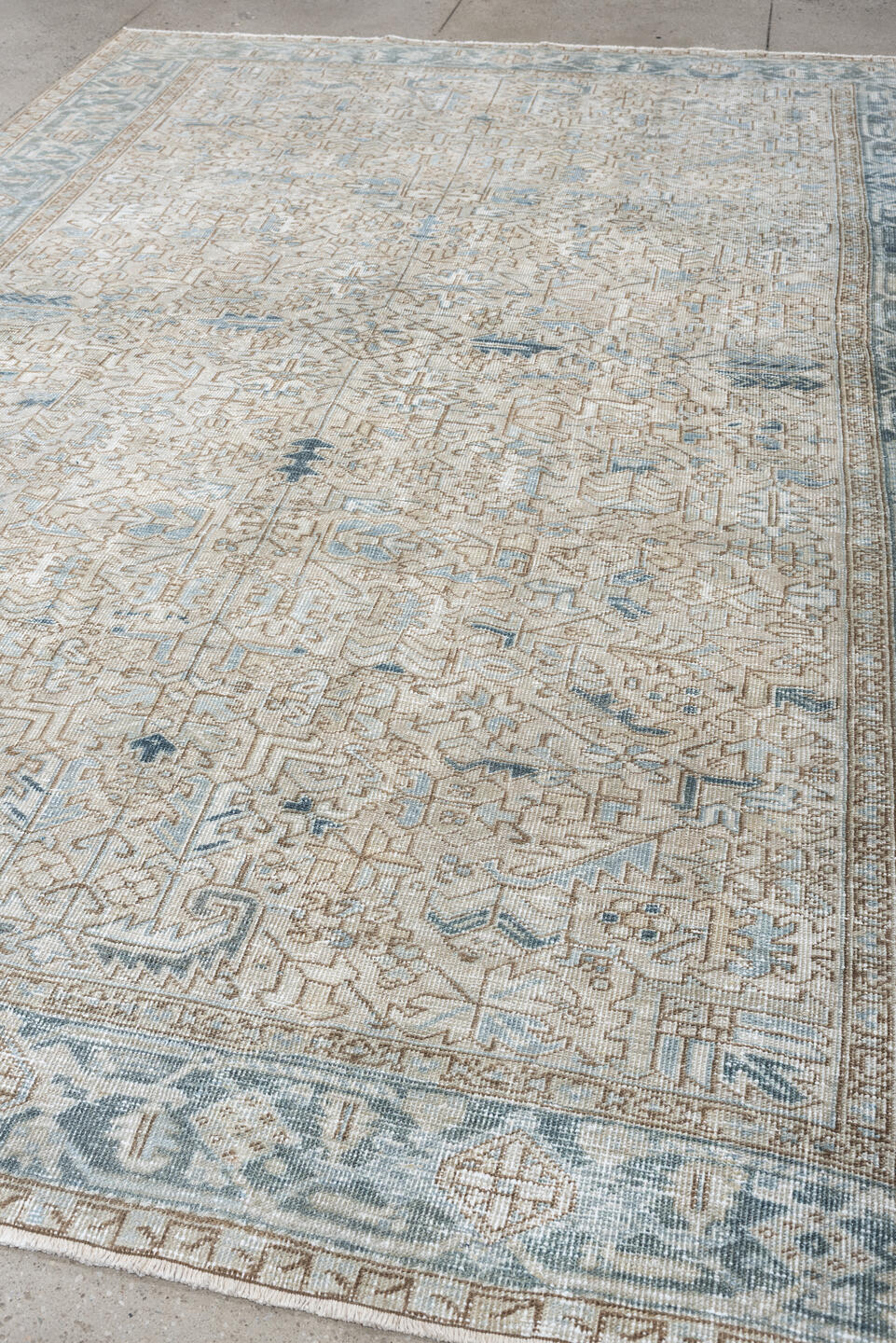 8' x 11' one-of-a-kind handmade antique Heriz large size rug. Color palette: ivory, slate blue, taupe, blue gray, camel
