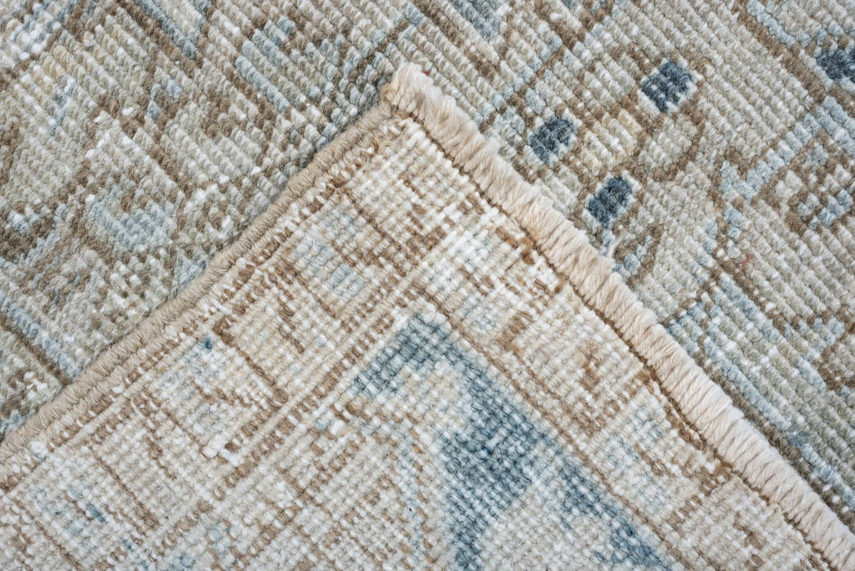 8' x 11' one-of-a-kind handmade antique Heriz large size rug. Color palette: ivory, slate blue, taupe, blue gray, camel