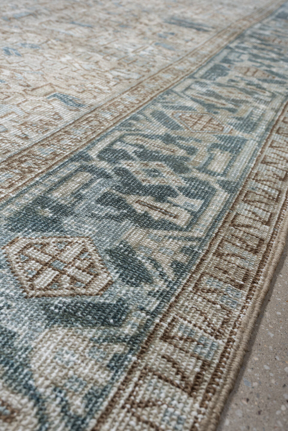 8' x 11' one-of-a-kind handmade antique Heriz large size rug. Color palette: ivory, slate blue, taupe, blue gray, camel