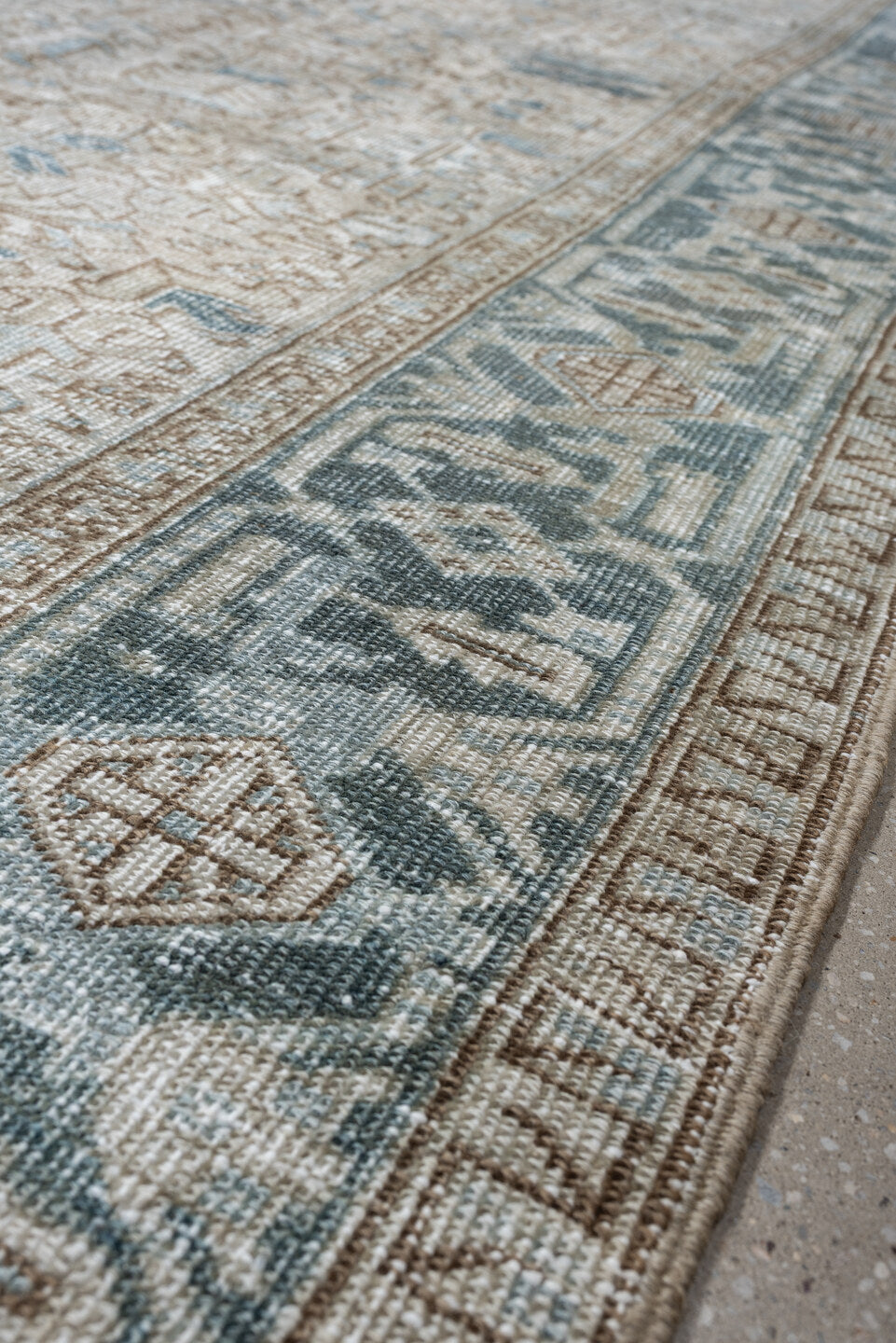 8' x 11' one-of-a-kind handmade antique Heriz large size rug. Color palette: ivory, slate blue, taupe, blue gray, camel