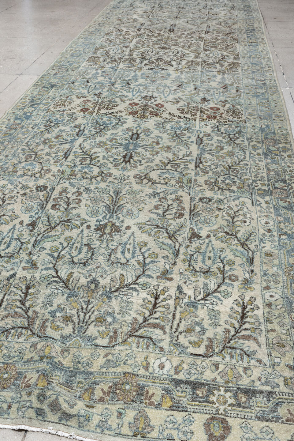 5' x 19' one-of-a-kind handmade antique Lilian rug. Color palette: ivory, powder blue, sage, taupe, brown, soft rust