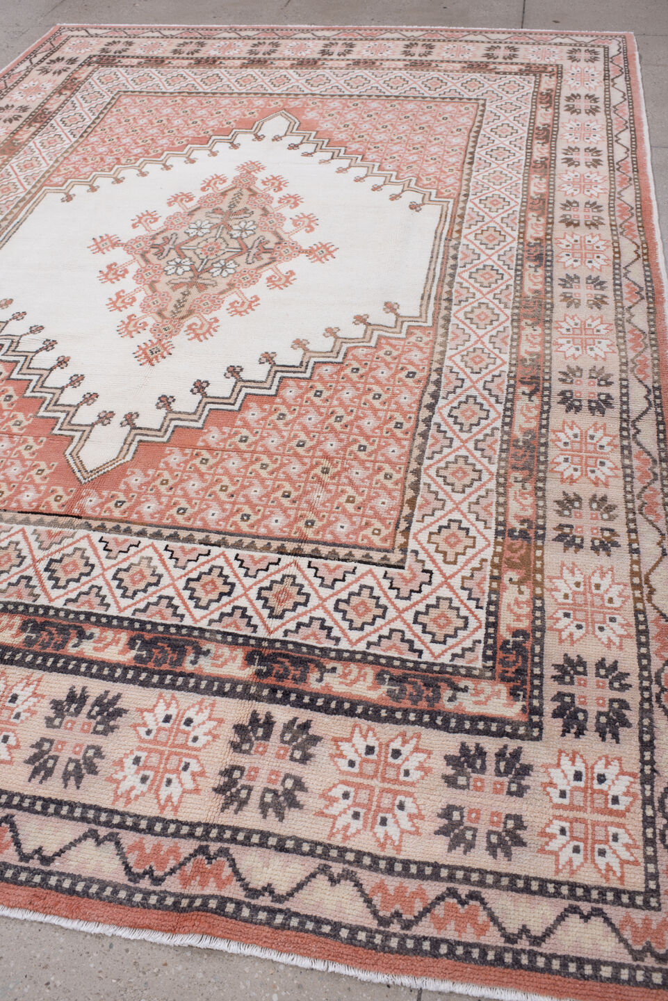 7' x 10' one-of-a-kind handmade antique Moroccan large size rug. Color palette: ivory, terracotta, charcoal, dark brown