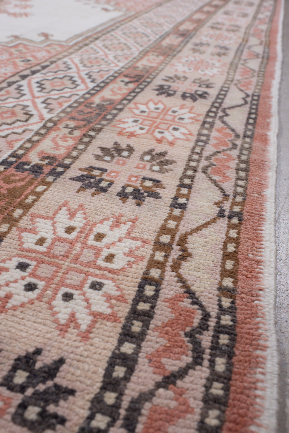 7' x 10' one-of-a-kind handmade antique Moroccan large size rug. Color palette: ivory, terracotta, charcoal, dark brown