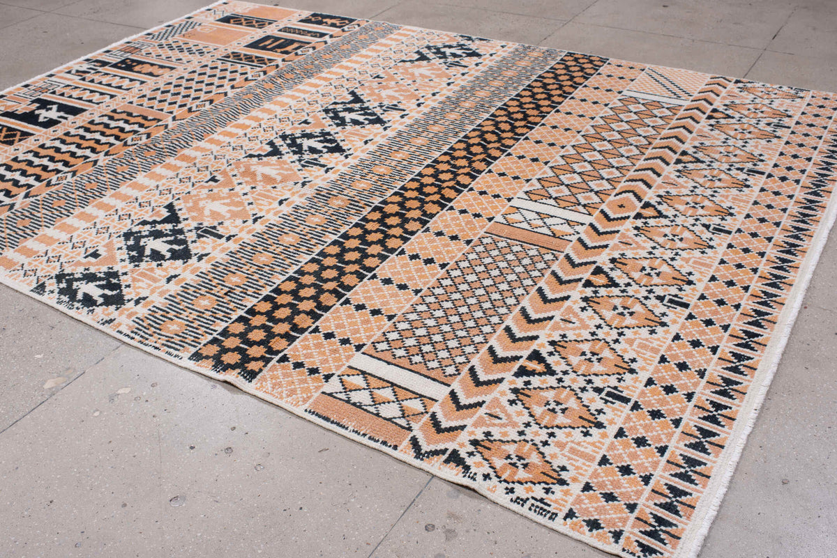 8' x 11' one-of-a-kind handmade antique Moroccan large size rug. Color palette: camel, ivory, ebony, charcoal, taupe, beige