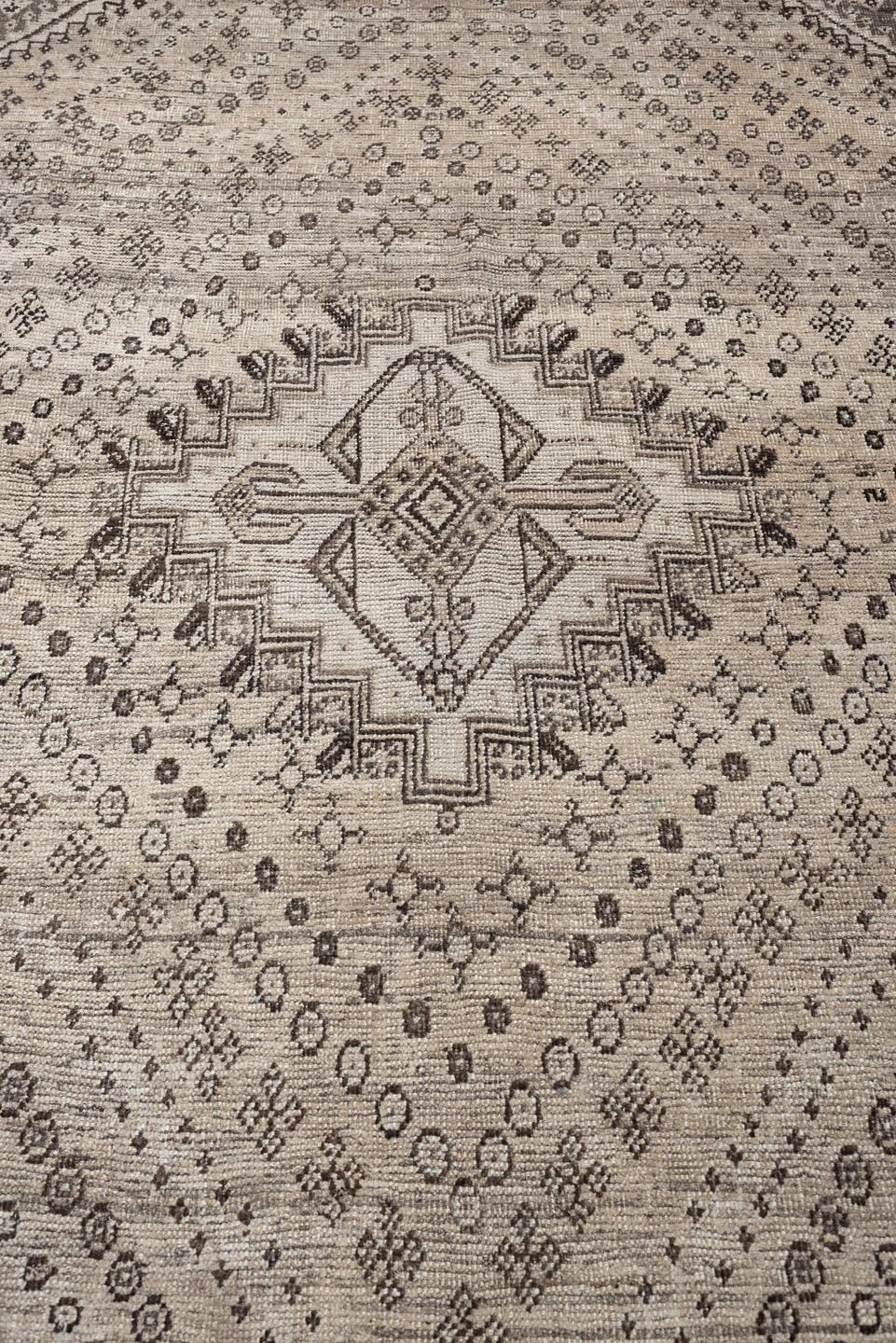 5' x 9' one-of-a-kind handmade antique Shiraz medium size rug. Color palette: ivory, taupe, charcoal, brown, camel, ebony