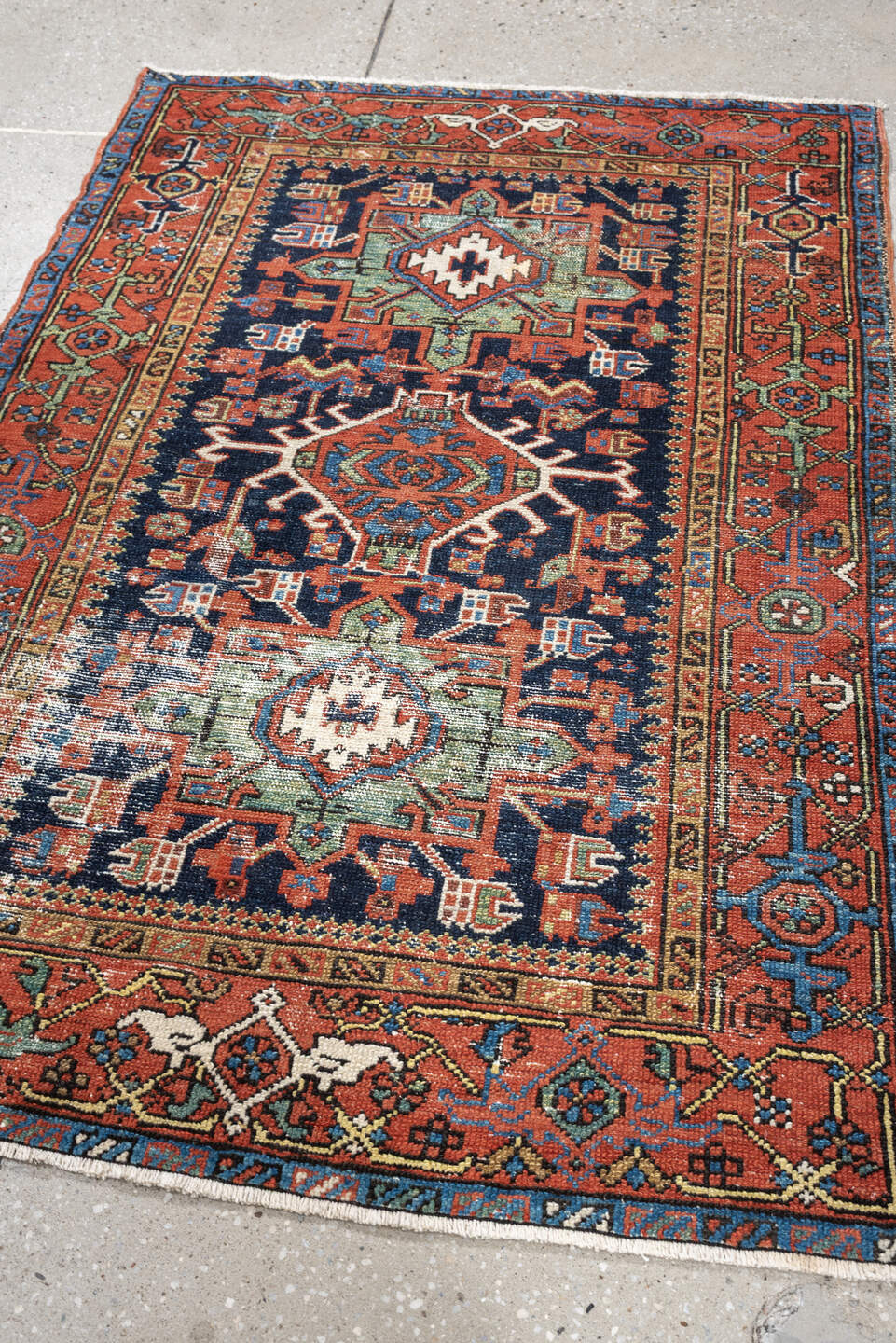3' x 4' one-of-a-kind handmade antique Karaje small size rug. Color palette: navy, rust, ivory, terra cotta, blue, sage