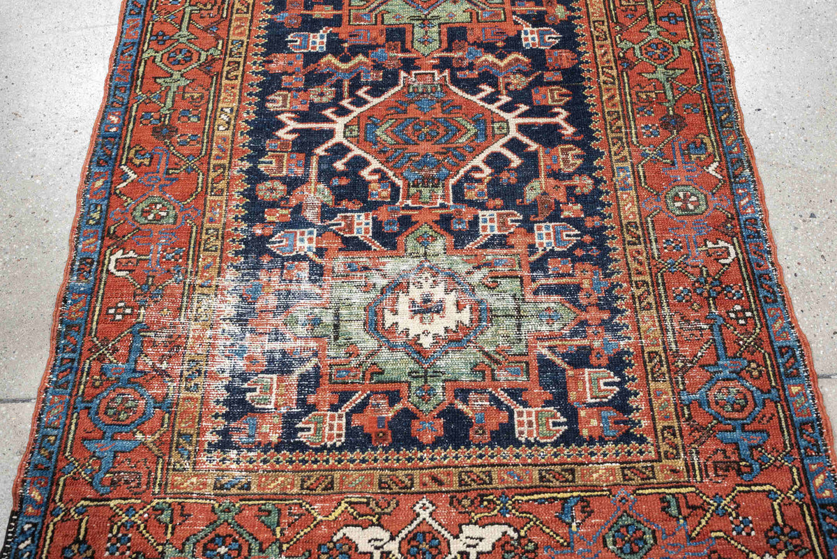 3' x 4' one-of-a-kind handmade antique Karaje small size rug. Color palette: navy, rust, ivory, terra cotta, blue, sage