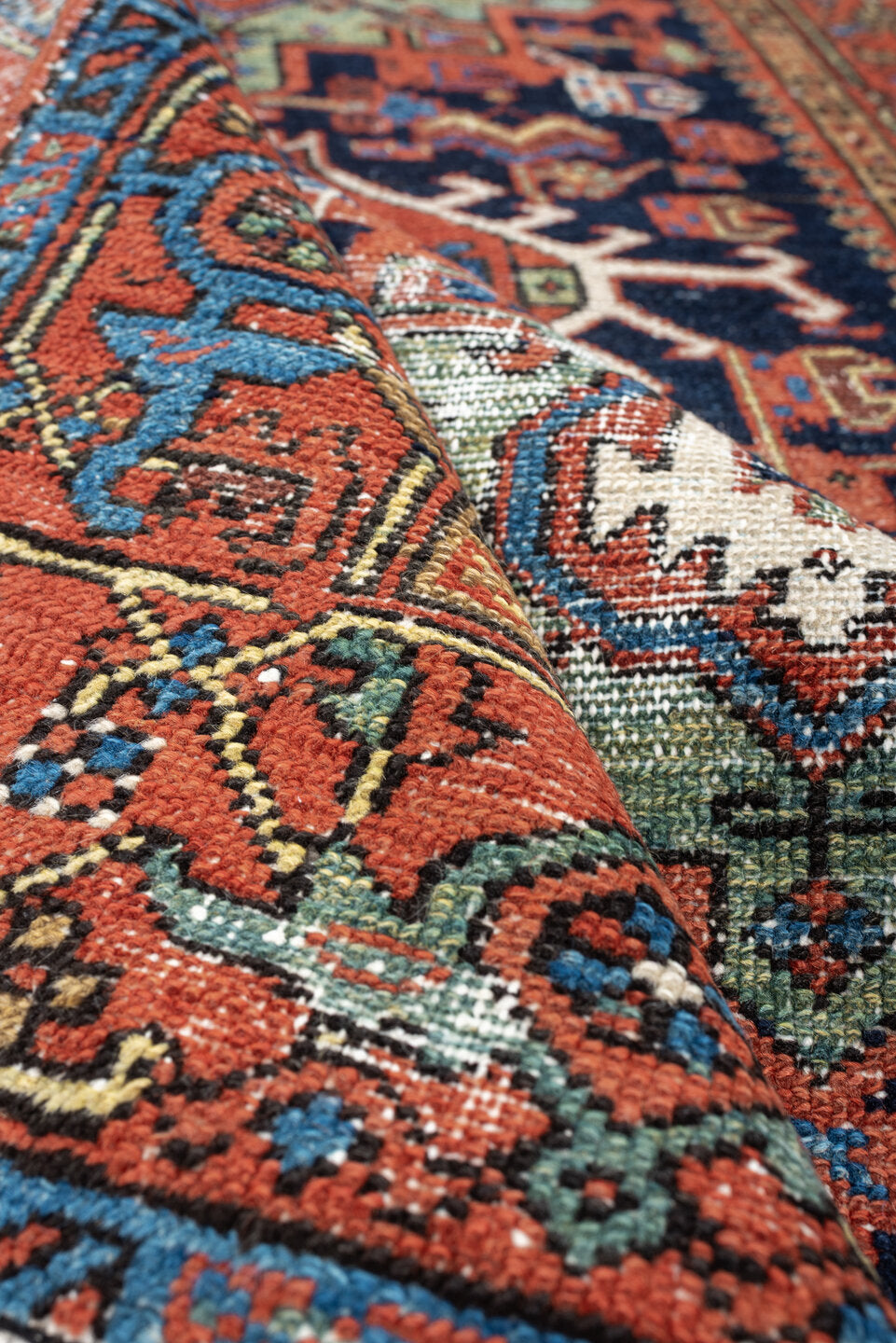 3' x 4' one-of-a-kind handmade antique Karaje small size rug. Color palette: navy, rust, ivory, terra cotta, blue, sage