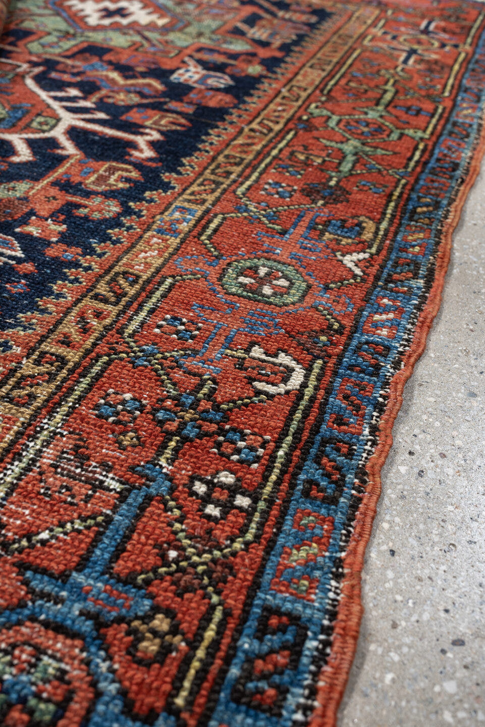 3' x 4' one-of-a-kind handmade antique Karaje small size rug. Color palette: navy, rust, ivory, terra cotta, blue, sage