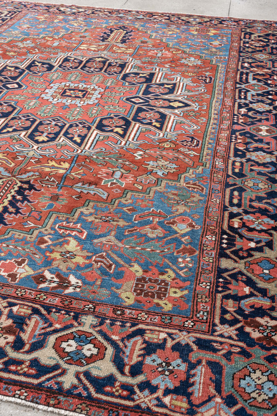8' x 10' one-of-a-kind handmade antique Heriz large size rug. Color palette: rust, sky blue, navy, ivory, coral, sage, camel