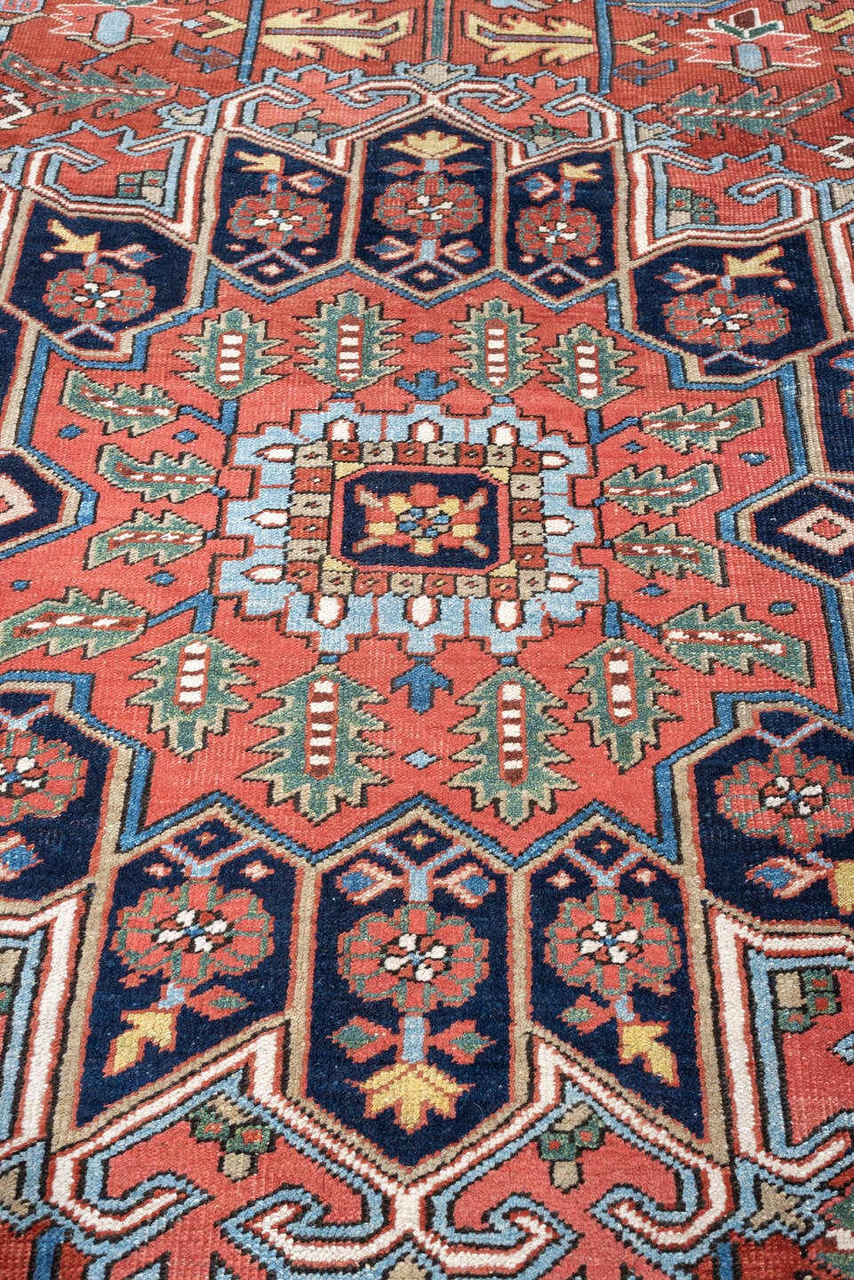 8' x 10' one-of-a-kind handmade antique Heriz large size rug. Color palette: rust, sky blue, navy, ivory, coral, sage, camel