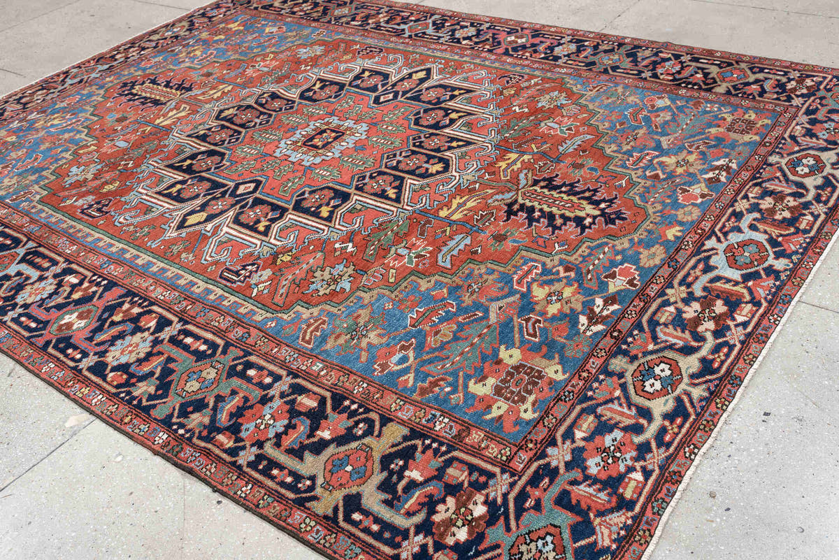 8' x 10' one-of-a-kind handmade antique Heriz large size rug. Color palette: rust, sky blue, navy, ivory, coral, sage, camel