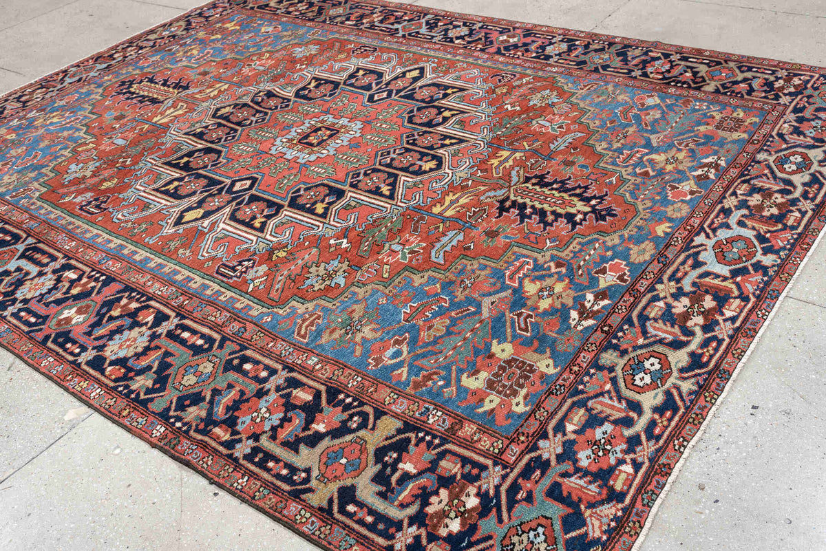 8' x 10' one-of-a-kind handmade antique Heriz large size rug. Color palette: rust, sky blue, navy, ivory, coral, sage, camel