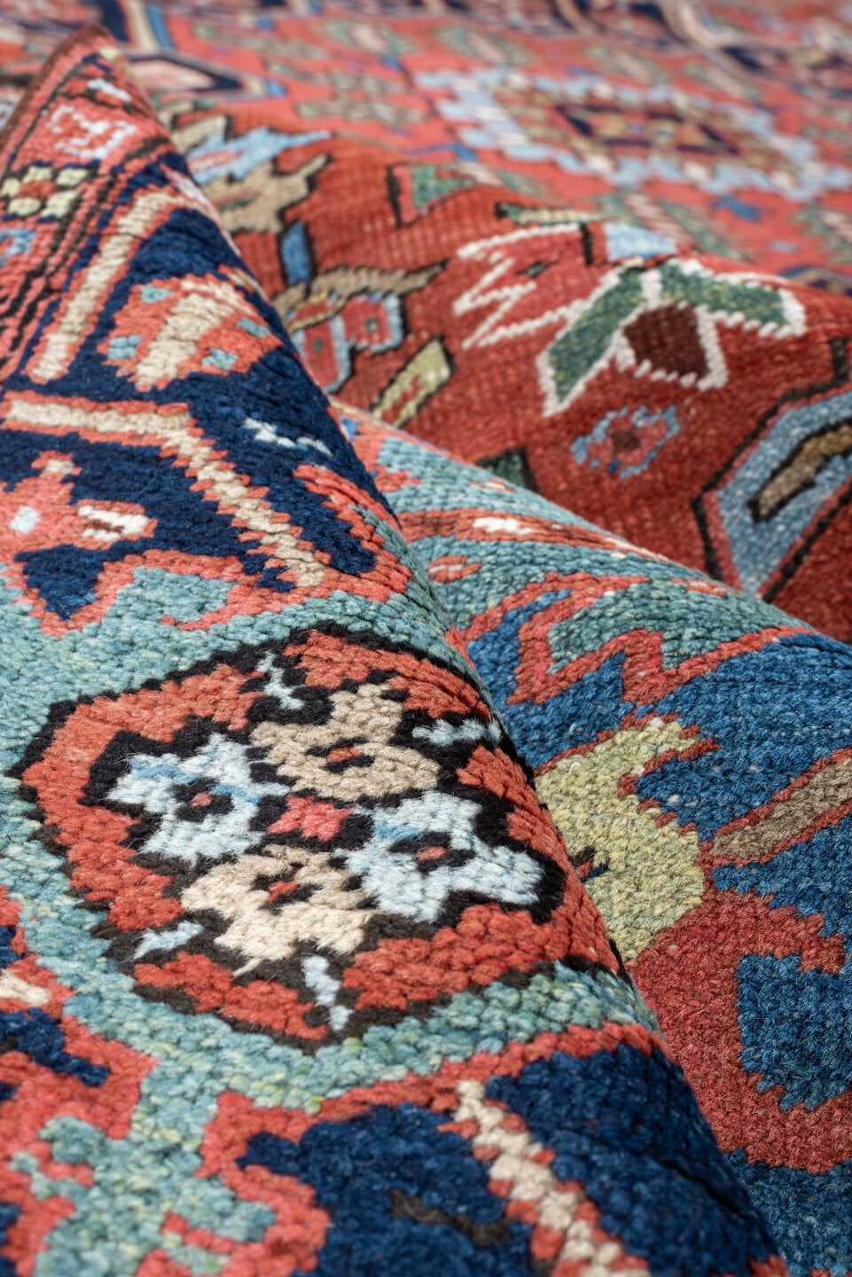 8' x 10' one-of-a-kind handmade antique Heriz large size rug. Color palette: rust, sky blue, navy, ivory, coral, sage, camel