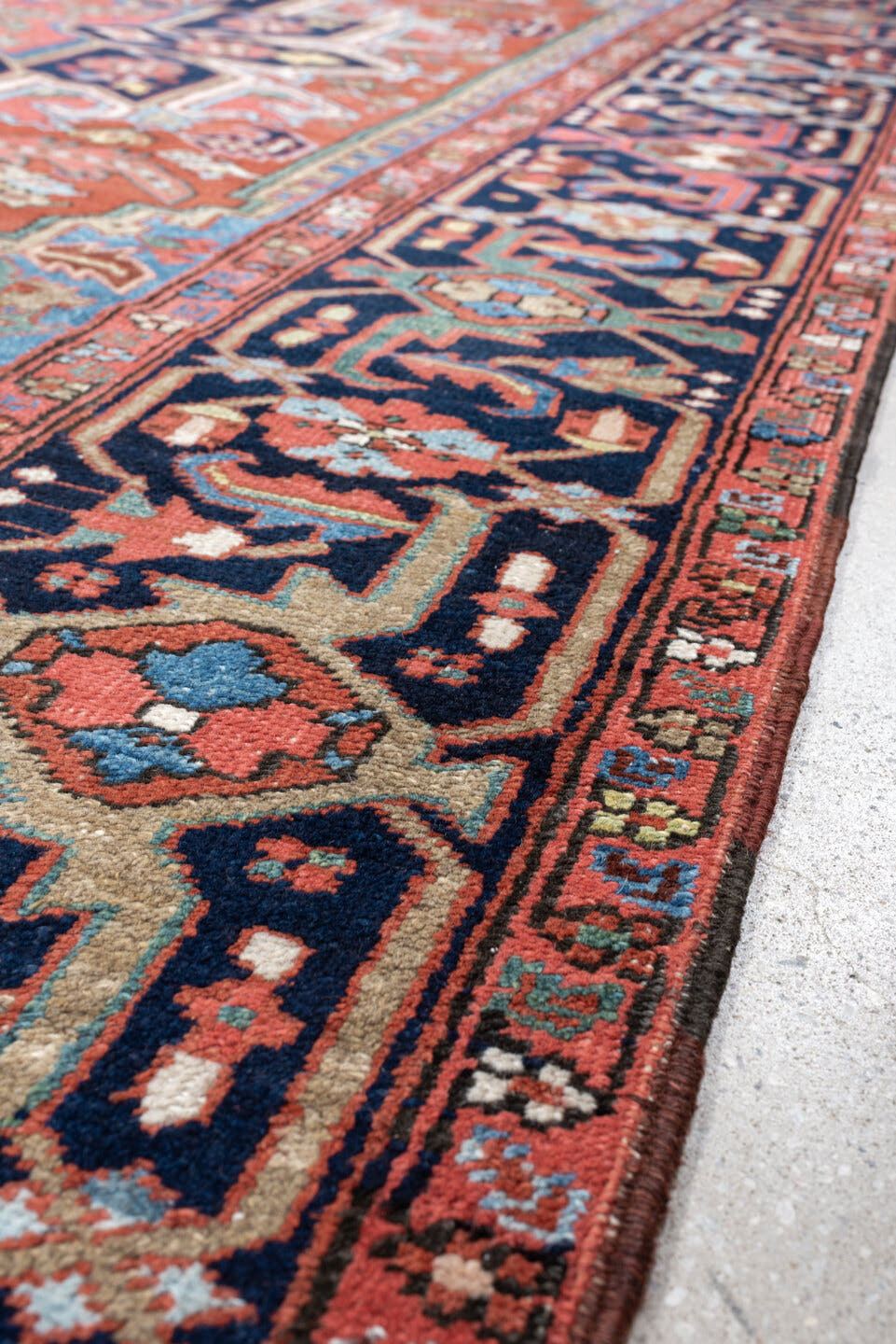 8' x 10' one-of-a-kind handmade antique Heriz large size rug. Color palette: rust, sky blue, navy, ivory, coral, sage, camel