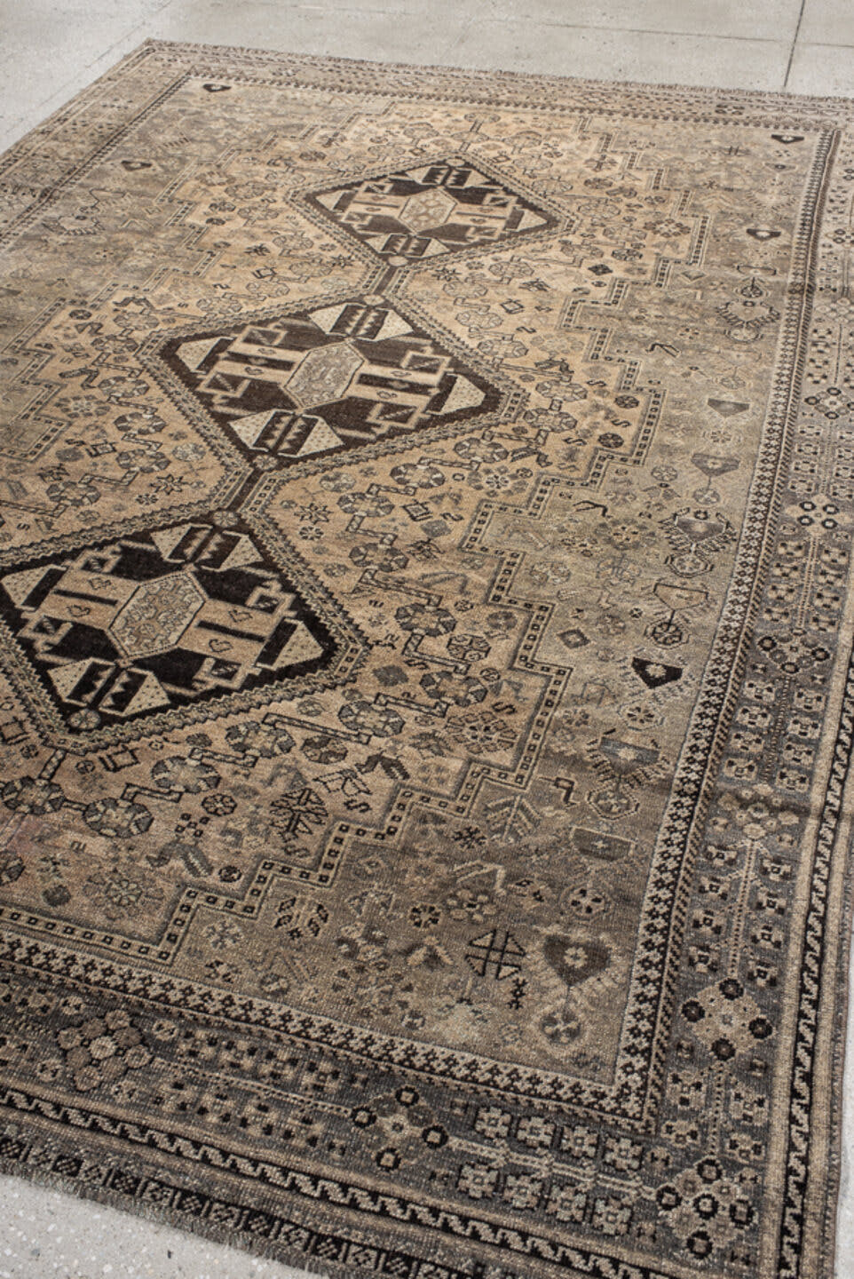 7' x 9' one-of-a-kind handmade vintage Shiraz large size rug. Color palette: ivory, taupe, charcoal, brown, camel, slate