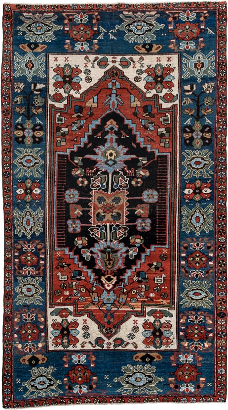 4' x 8' one-of-a-kind handmade vintage rug. Color palette: navy, rust, ivory, sky blue, black, crimson, sage, camel, blue