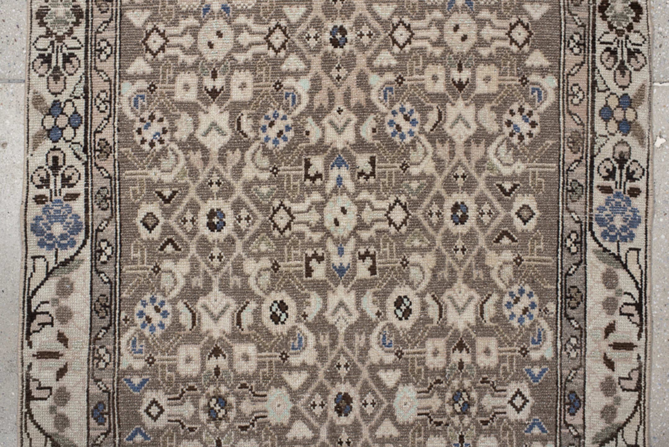 3' x 9' one-of-a-kind handmade vintage  runner rug. Color palette: taupe, ivory, brown, blue, charcoal, beige, gray, black