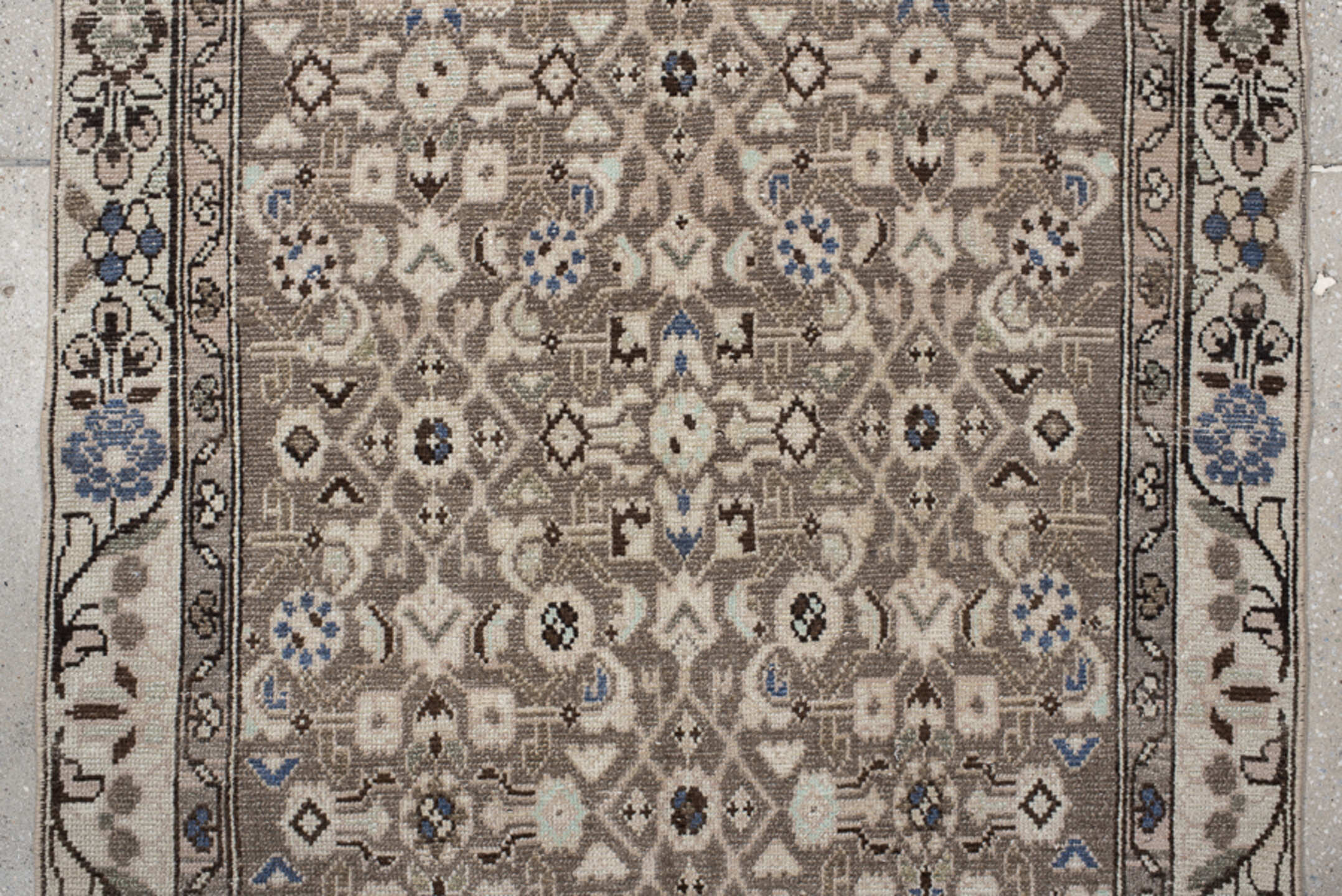 3' x 9' one-of-a-kind handmade vintage  runner rug. Color palette: taupe, ivory, brown, blue, charcoal, beige, gray, black