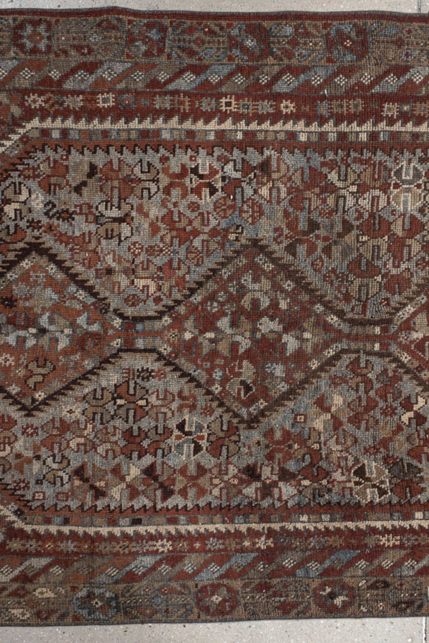 3' x 9' one-of-a-kind handmade vintage Shirvan runner rug. Color palette: rust, ivory, slate, brown, charcoal, taupe