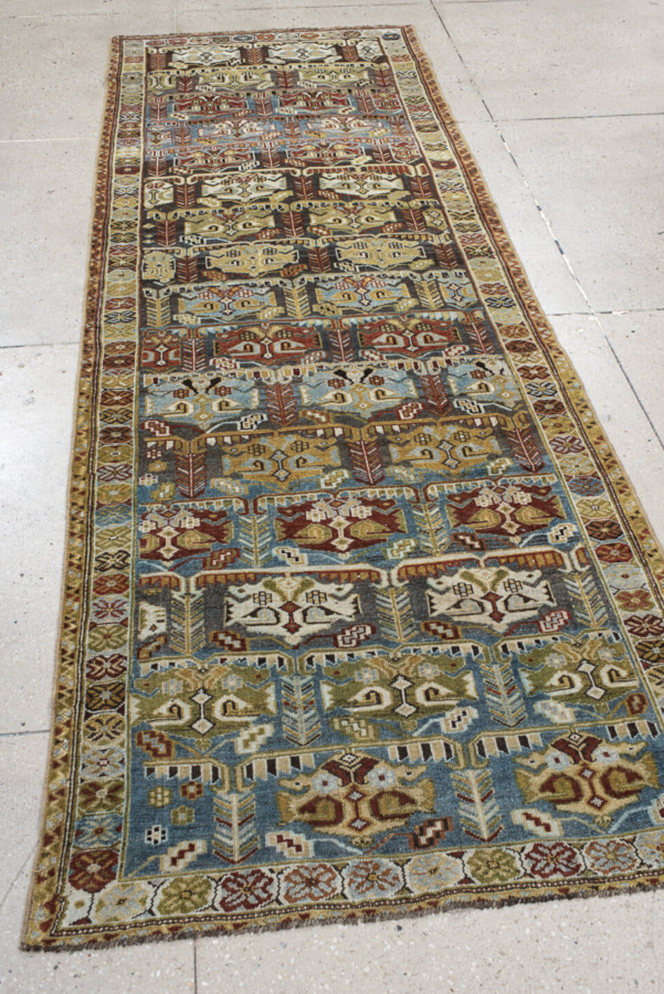 3' x 9' one-of-a-kind handmade vintage NW Persian runner rug. Color palette: ivory, sky blue, olive, rust, brown, charcoal