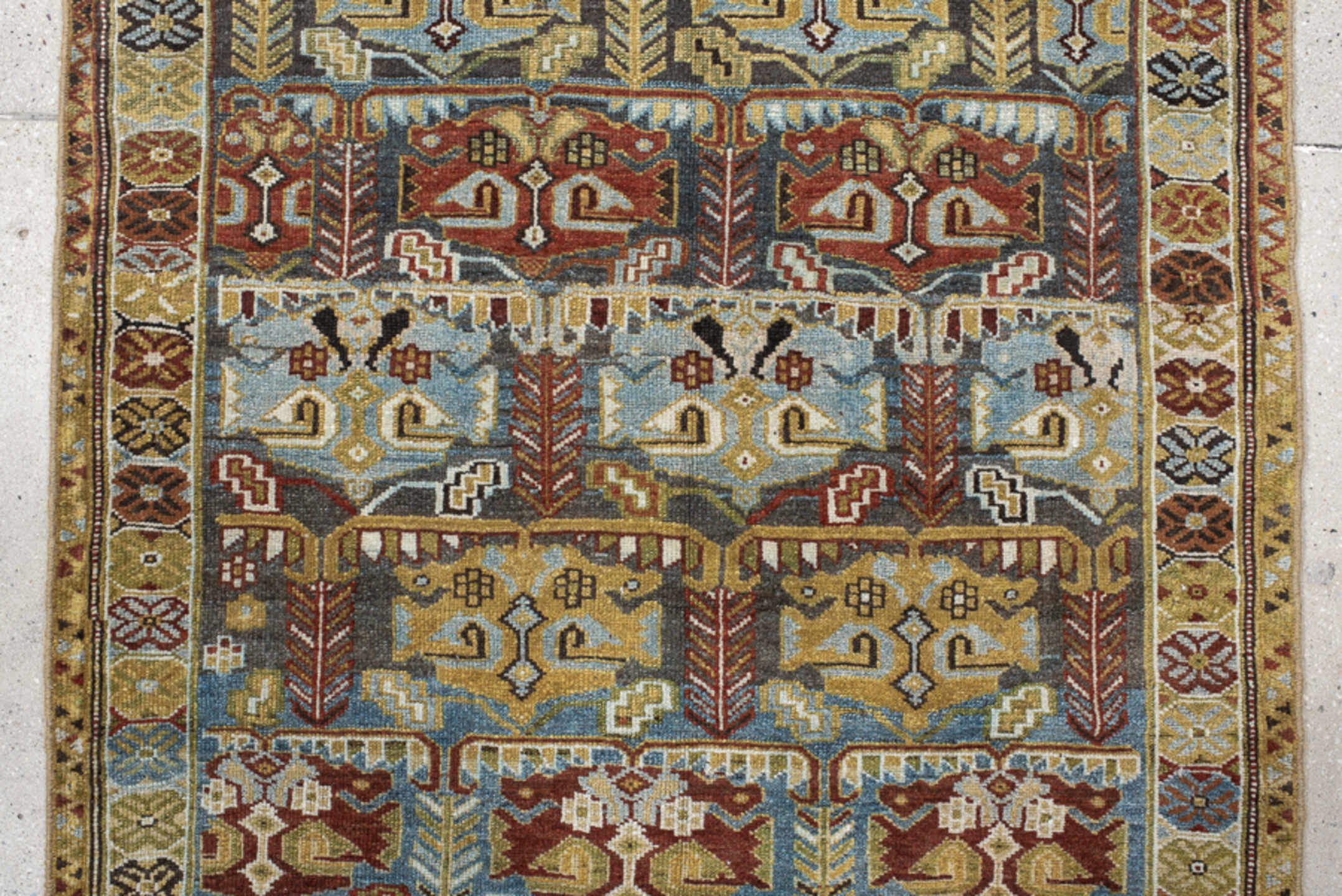 3' x 9' one-of-a-kind handmade vintage NW Persian runner rug. Color palette: ivory, sky blue, olive, rust, brown, charcoal
