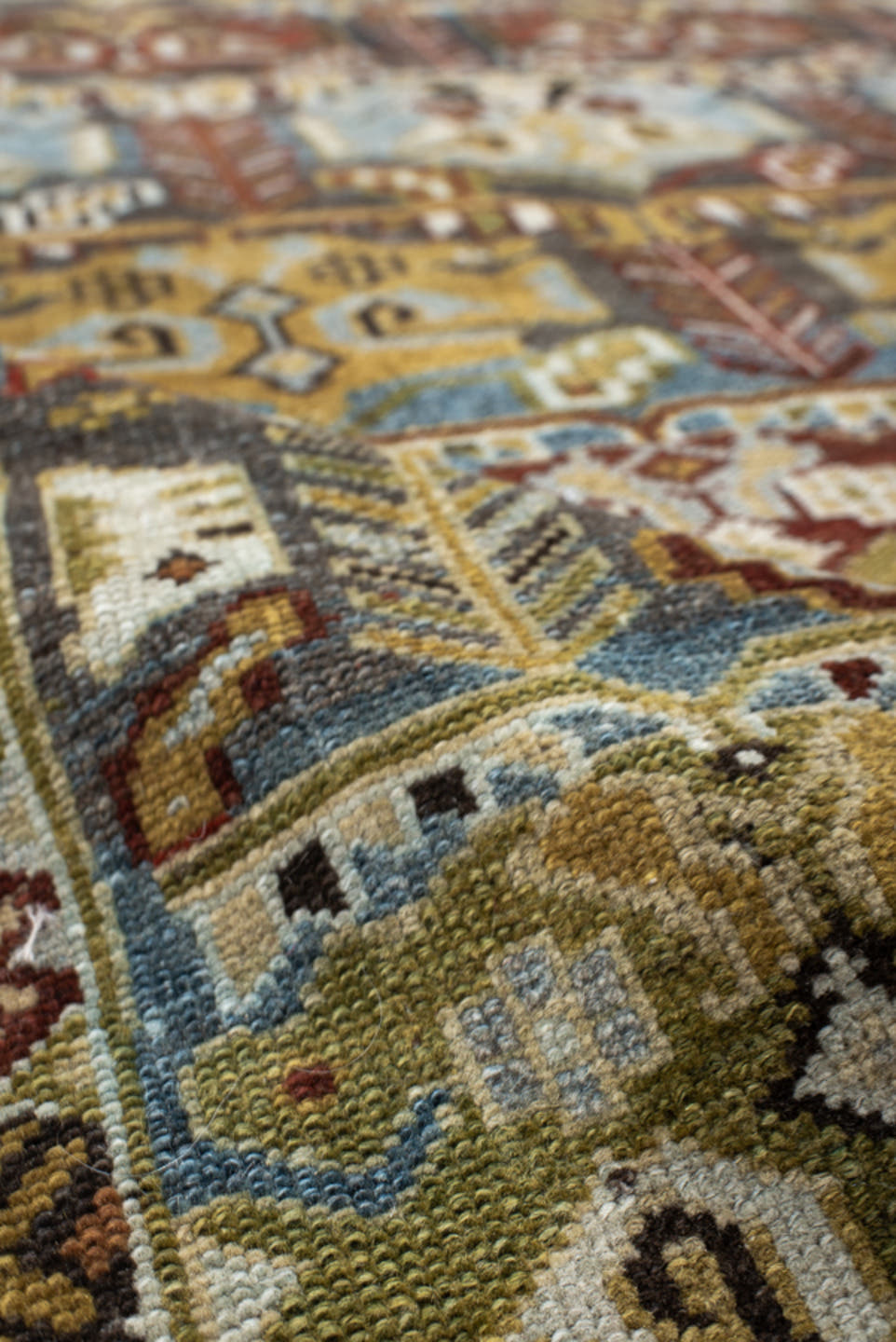 3' x 9' one-of-a-kind handmade vintage NW Persian runner rug. Color palette: ivory, sky blue, olive, rust, brown, charcoal