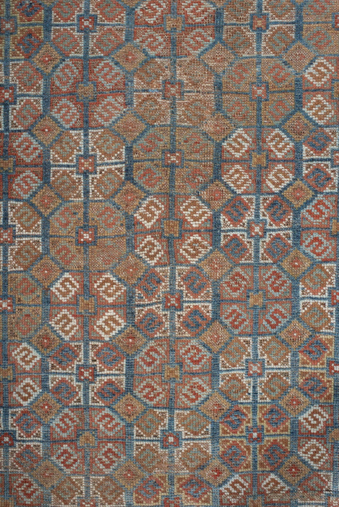 4' x 7' one-of-a-kind handmade vintage Shiraz rug. Color palette: terra cotta, camel, blue, ivory, rust, taupe, terracotta